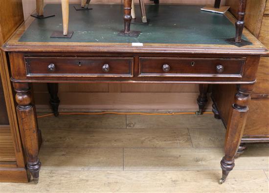 A mid Victorian mahogany two drawer writing table, W.3ft 6in.